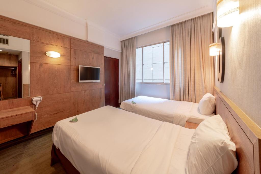 Двухместный (Двухместный номер Делюкс с 2 отдельными кроватями), Hotel Bencoolen Singapore