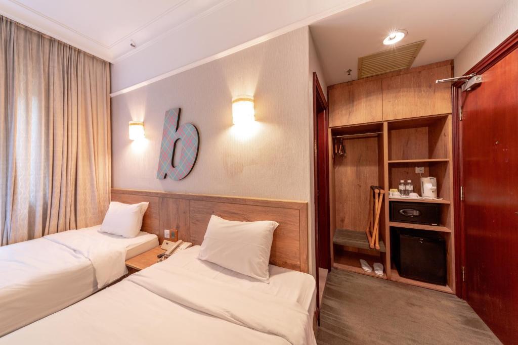 Двухместный (Двухместный номер Делюкс с 2 отдельными кроватями), Hotel Bencoolen Singapore
