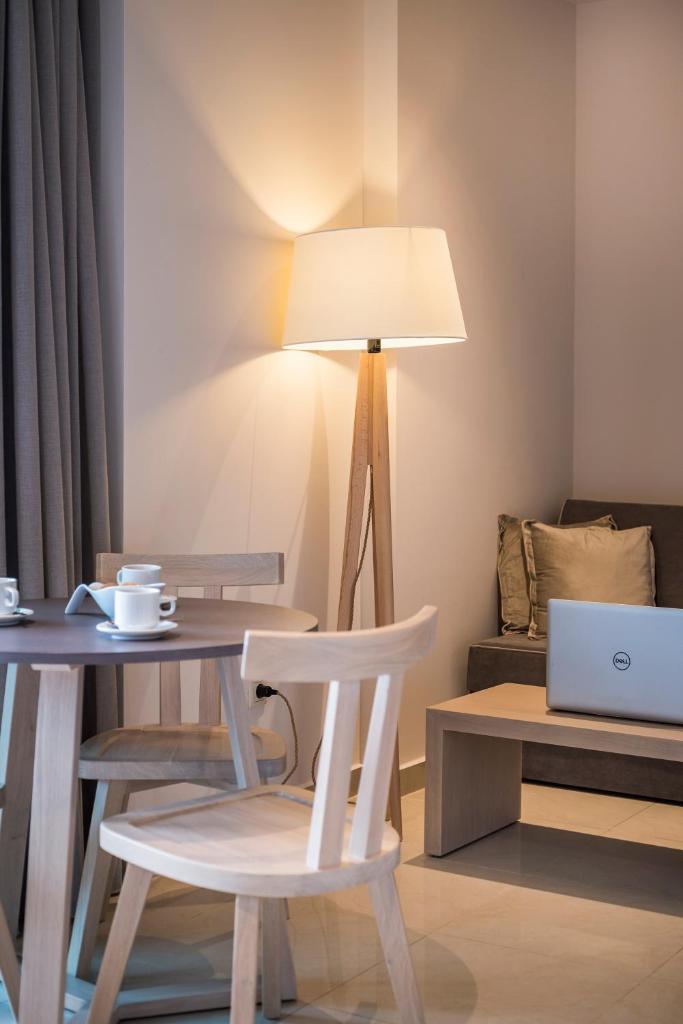 Trianon Luxury Apartments & Suites - Tap to explore photos