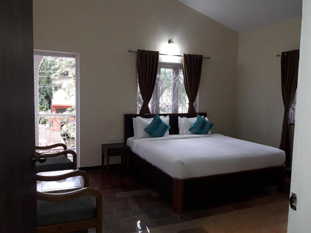 Двухместный (Двухместный номер Делюкс с 1 кроватью), Rudraksha Holiday Homes