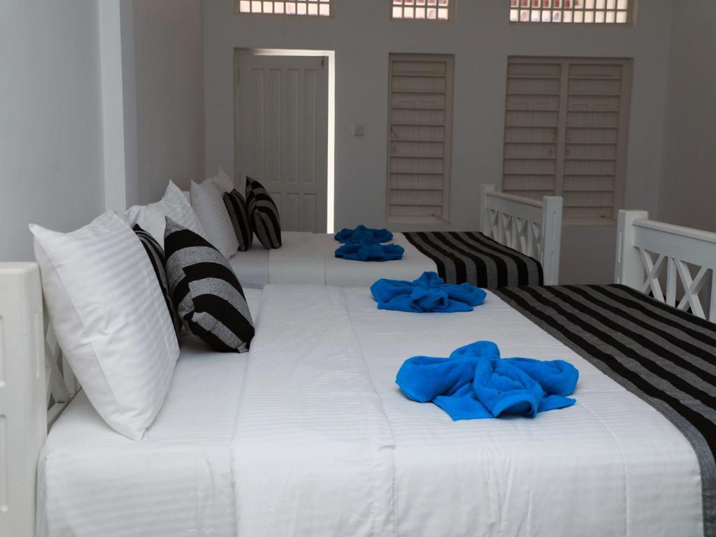 Трехместный (Трехместный номер Делюкс с частичным видом на море), Wadiya Guesthouse