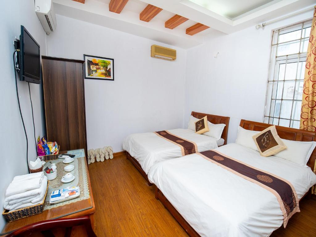 Двухместный (Двухместный номер Делюкс с 2 отдельными кроватями), Phuong Dong hotel