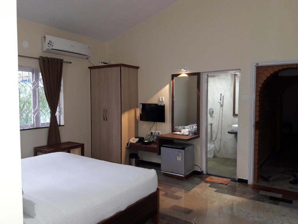 Двухместный (Двухместный номер Делюкс с 1 кроватью), Rudraksha Holiday Homes