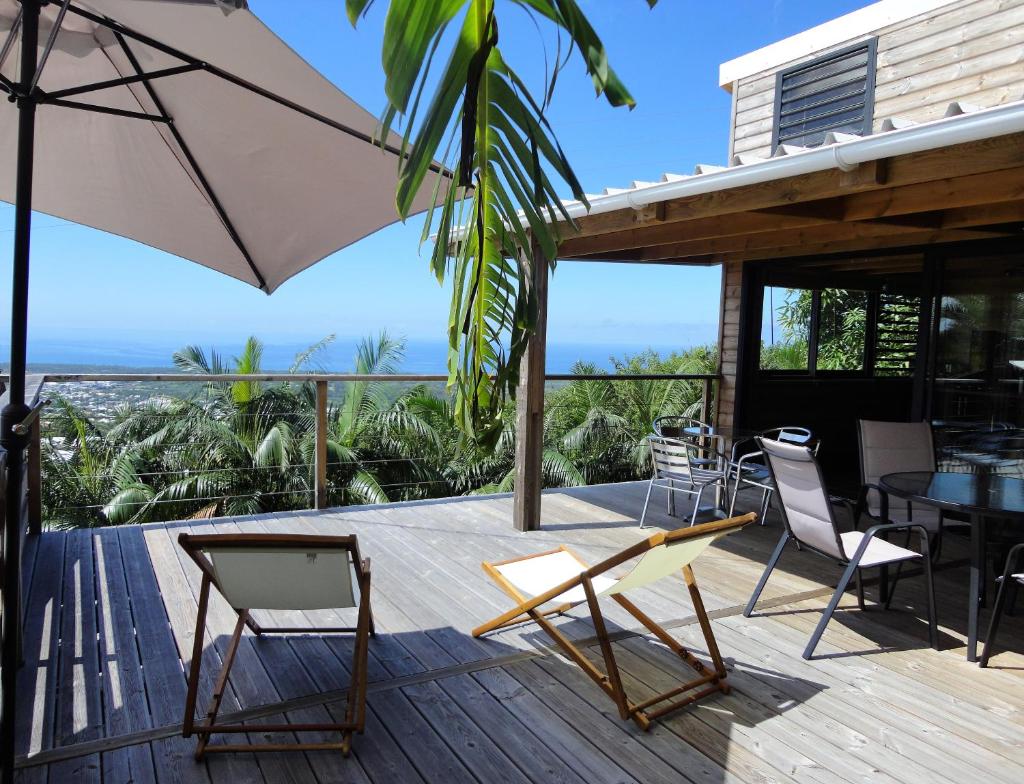 Lounge des hauts 3 maisons à L'étang-Salé sans vis à vis avec vue panoramique Océan et Montagne photo 3