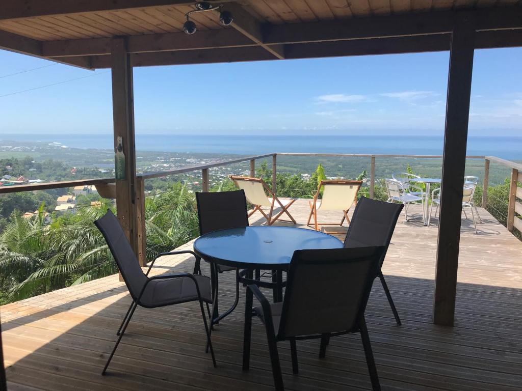 Lounge des hauts 3 maisons à L'étang-Salé sans vis à vis avec vue panoramique Océan et Montagne photo 1