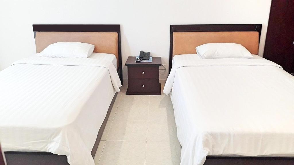 Двухместный (Двухместный номер Делюкс с 2 отдельными кроватями), Long Beach Hotel