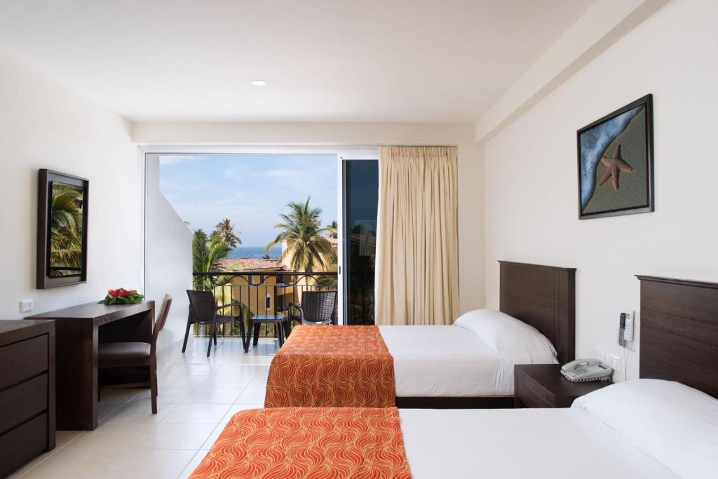 Двухместный (Двухместный номер Делюкс с 1 кроватью и балконом), Costa Club Punta Arena Beach Resort - Все включено