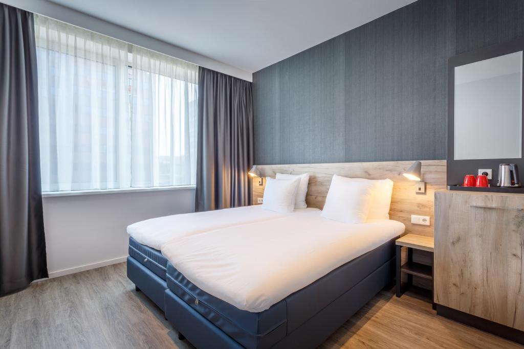 Двухместный (Двухместный номер Делюкс с 2 отдельными кроватями), Joy Hotel
