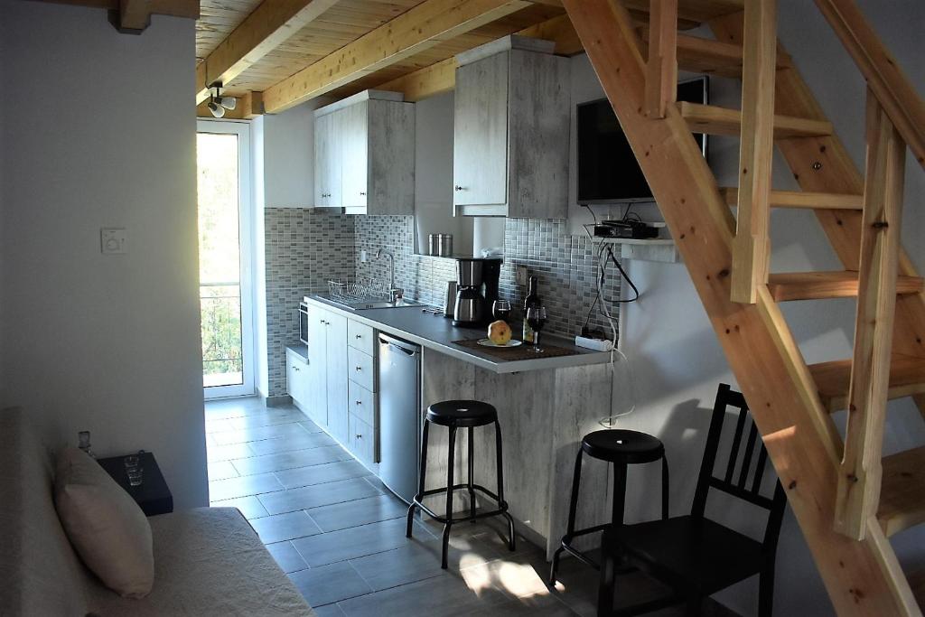 Christos Raches traditional houses photo 1