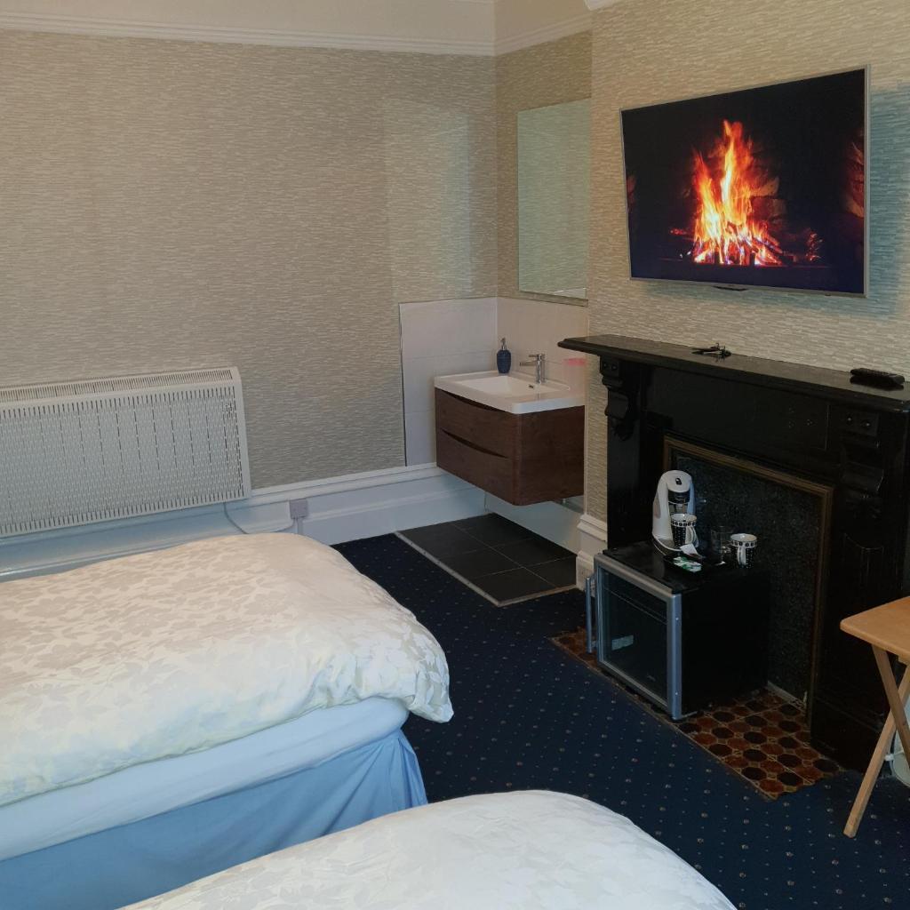 Abinger Guest House - Tap to explore photos