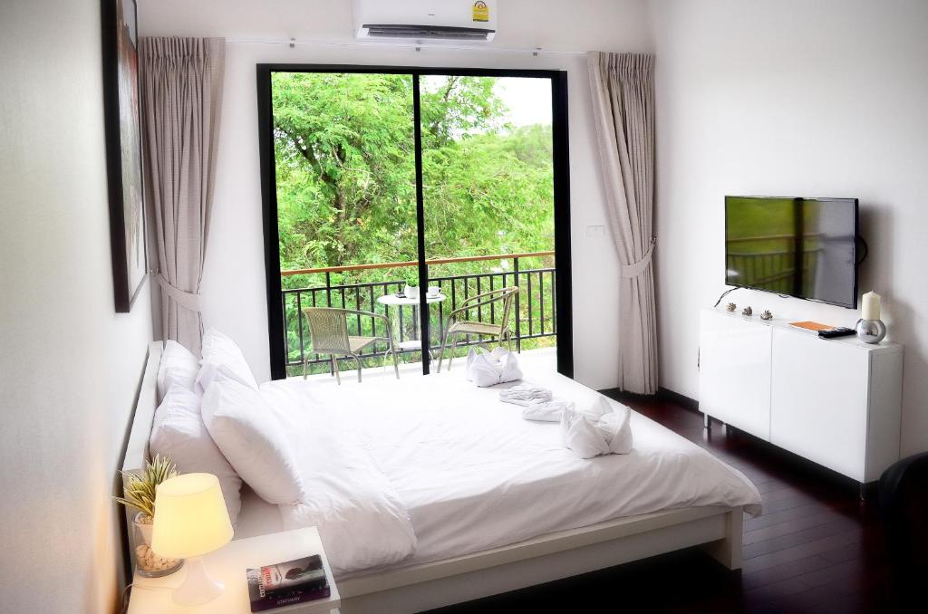 Двухместный (Номер Делюкс с кроватью размера «queen-size»), The Title East Wing by Trips Phuket