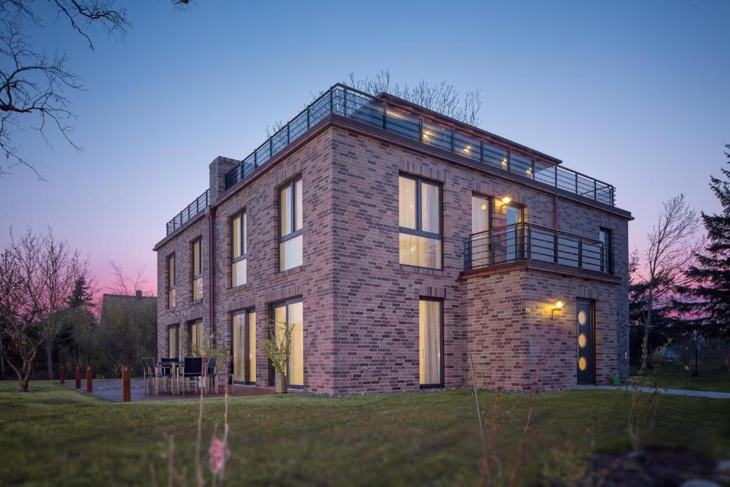 Villa Lotsenhäuser Rügen - Luxus Ferienhaus - 3 Schlafzimmer - Sauna - Dachterrasse mit Boddenblick