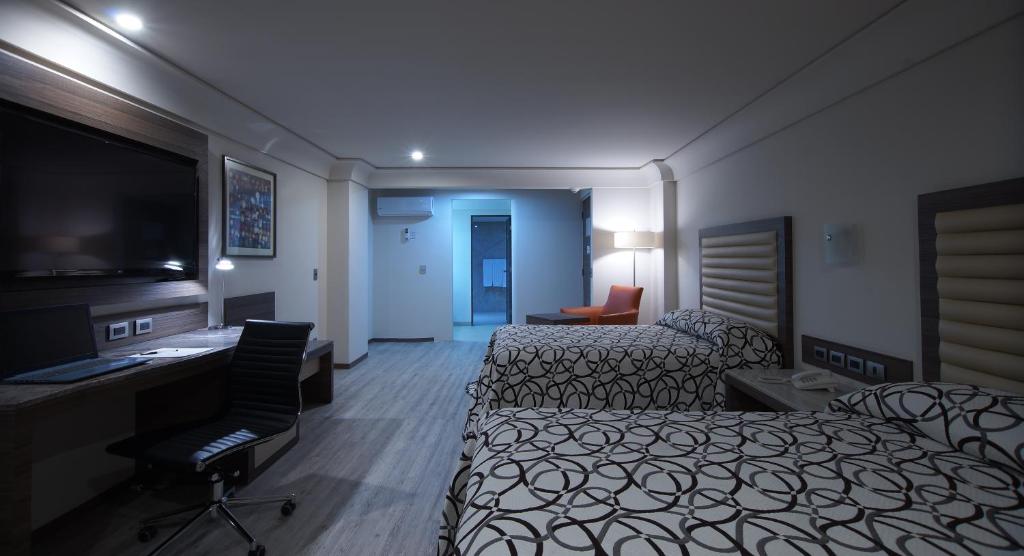 Двухместный (Двухместный номер Делюкс с 2 отдельными кроватями), Econo Express Hotel