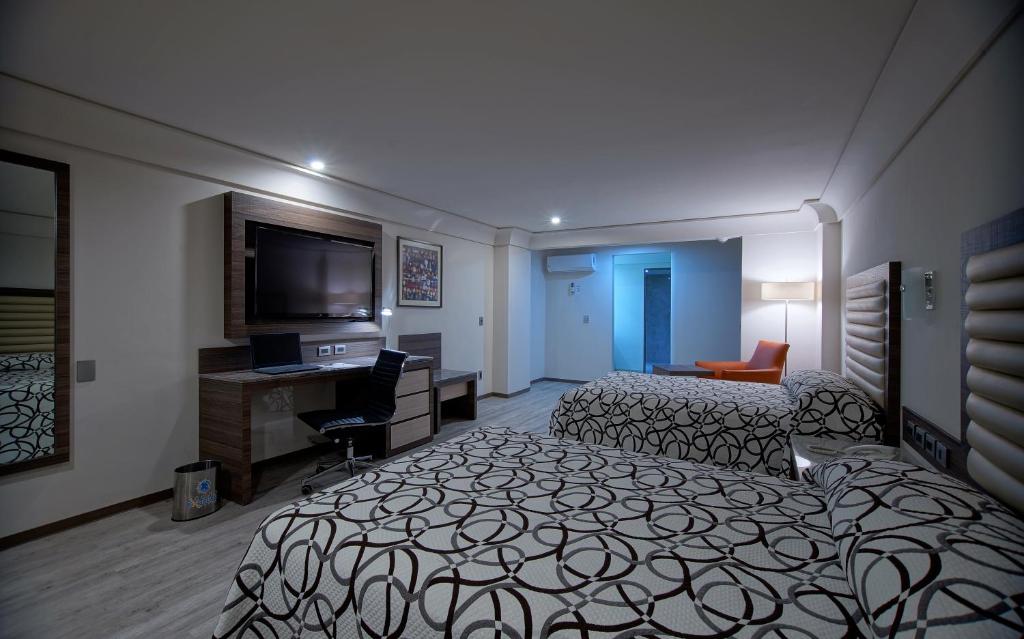 Двухместный (Двухместный номер Делюкс с 2 отдельными кроватями), Econo Express Hotel