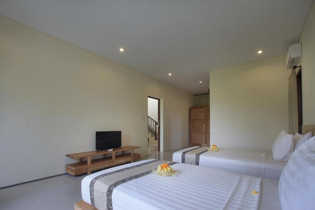 Вилла (Семейная вилла с 2 спальнями, вид на рисовое поле), Kabinawa Ubud Villas