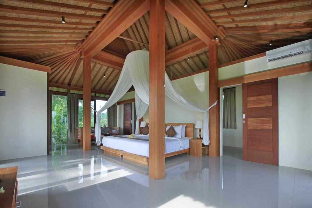 Вилла (Семейная вилла с 2 спальнями, вид на рисовое поле), Kabinawa Ubud Villas