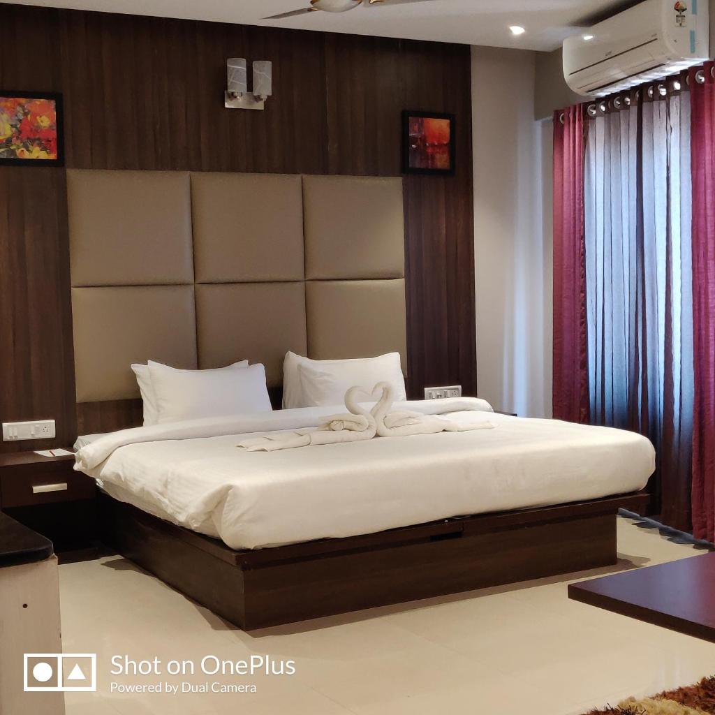 Двухместный (Улучшенный двухместный номер с 1 кроватью), iWE Suites by Pathtrails