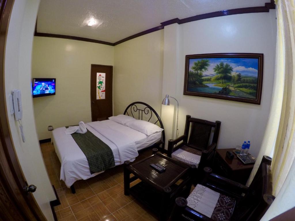 The Executive Villa Inn & Suites photo 1