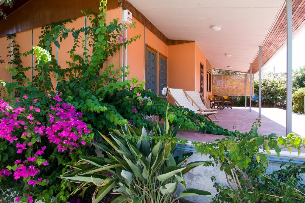 THE BOUCAMVIGLIA BEACH HOUSE photo 2