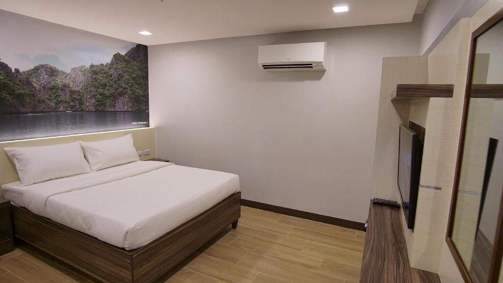 Двухместный (Двухместный номер Делюкс с 1 кроватью), Sugbutel Family Hotel
