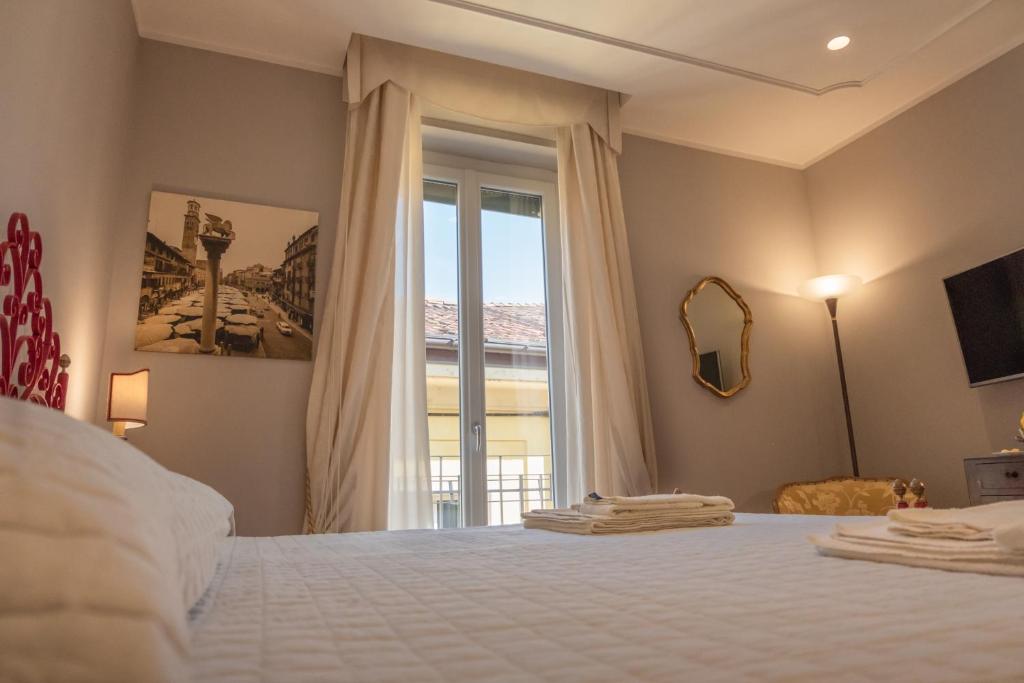 La Nuova Corte Rooms - Tap to explore photos