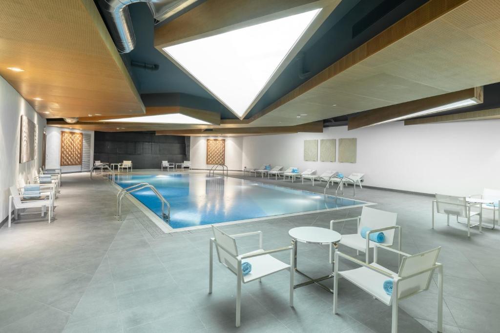 Radisson Blu Hotel & Residence, Riyadh Diplomatic Quarters - Tap to explore photos