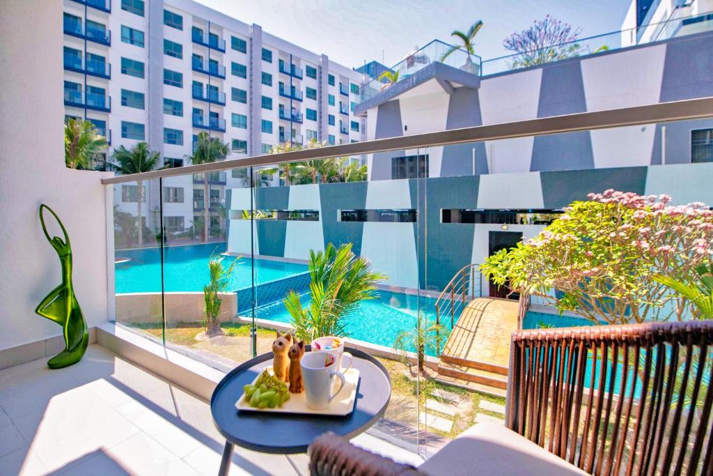 Апартаменты (Эксклюзивный люкс с 2 спальнями - Вид на бассейн), Arcadia Beach Resort Pattaya