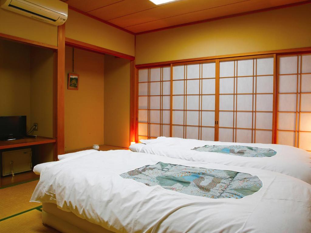 Ryokan Chinsen-Rou - Tap to explore photos