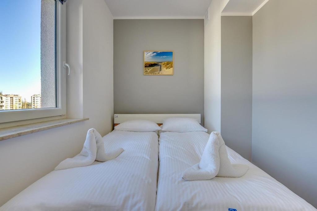 Апартаменты (Апартаменты с 1 спальней, балконом и парковкой), Apartamenty Apartinfo Chmielna Park