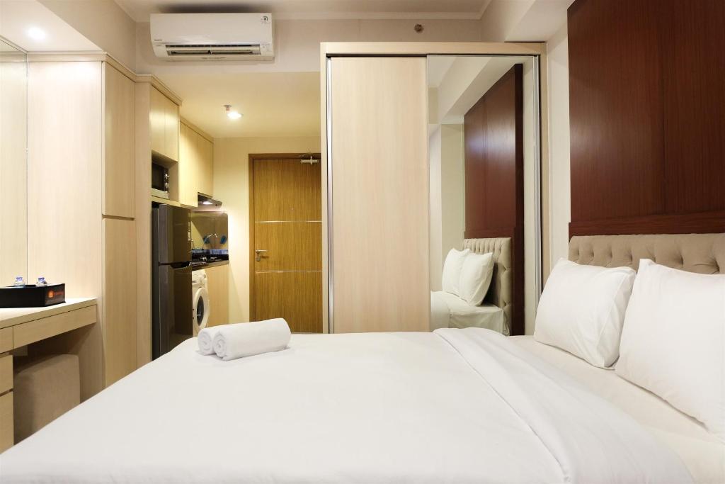 Artistic Studio Apartment at The Oasis Cikarang By Travelio photo 3
