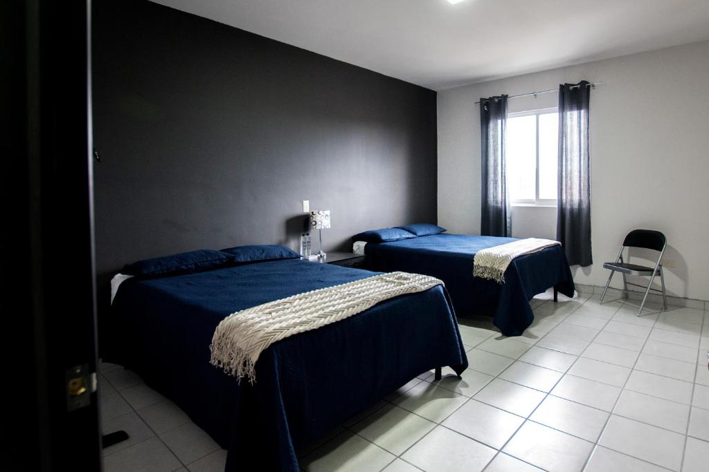Hotel San Luis - Tap to explore photos