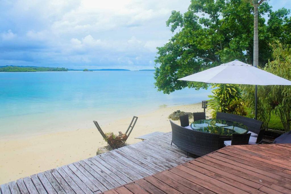 Santo Sunset Beach Villas on Surunda Bay photo 4