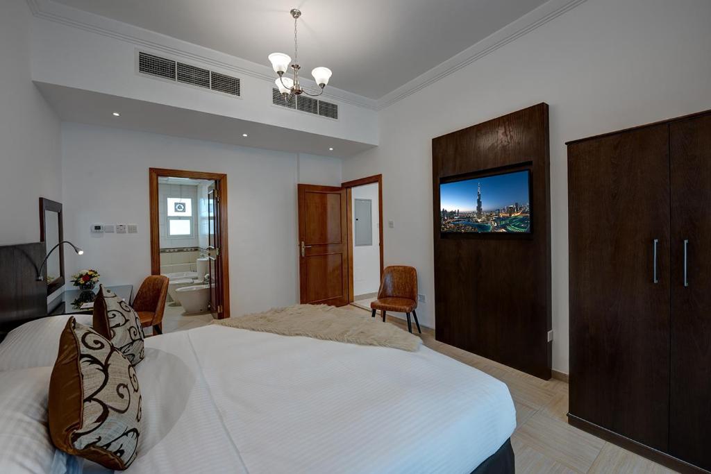 {
  "en-gb": "J5 Four Bedroom Villa Holiday home in Mirdif"
} photo 4