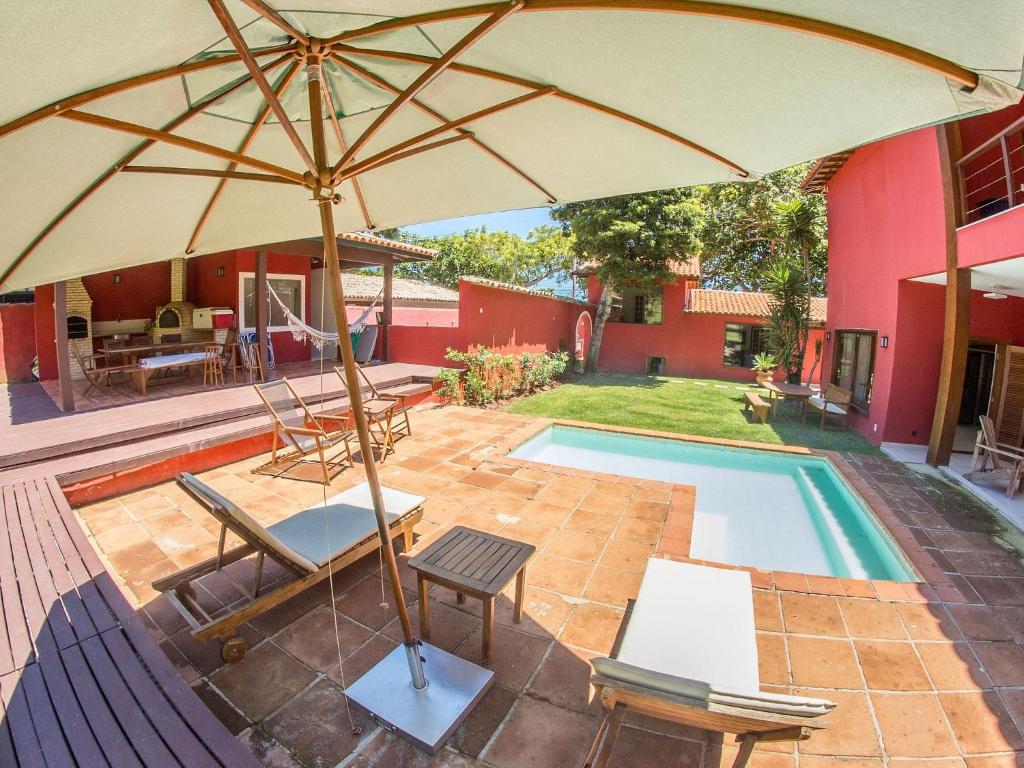 Mansão com Seis Suítes Pé na Areia da Praia dos Ossos e Próx. à Rua das Pedras Por Luxury Rentals photo 4