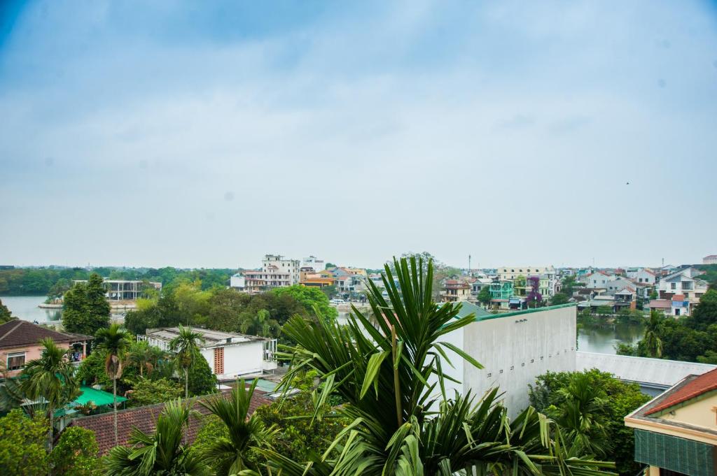 Двухместный (Двухместный номер Делюкс с 2 отдельными кроватями), Hue Four Seasons Hotel