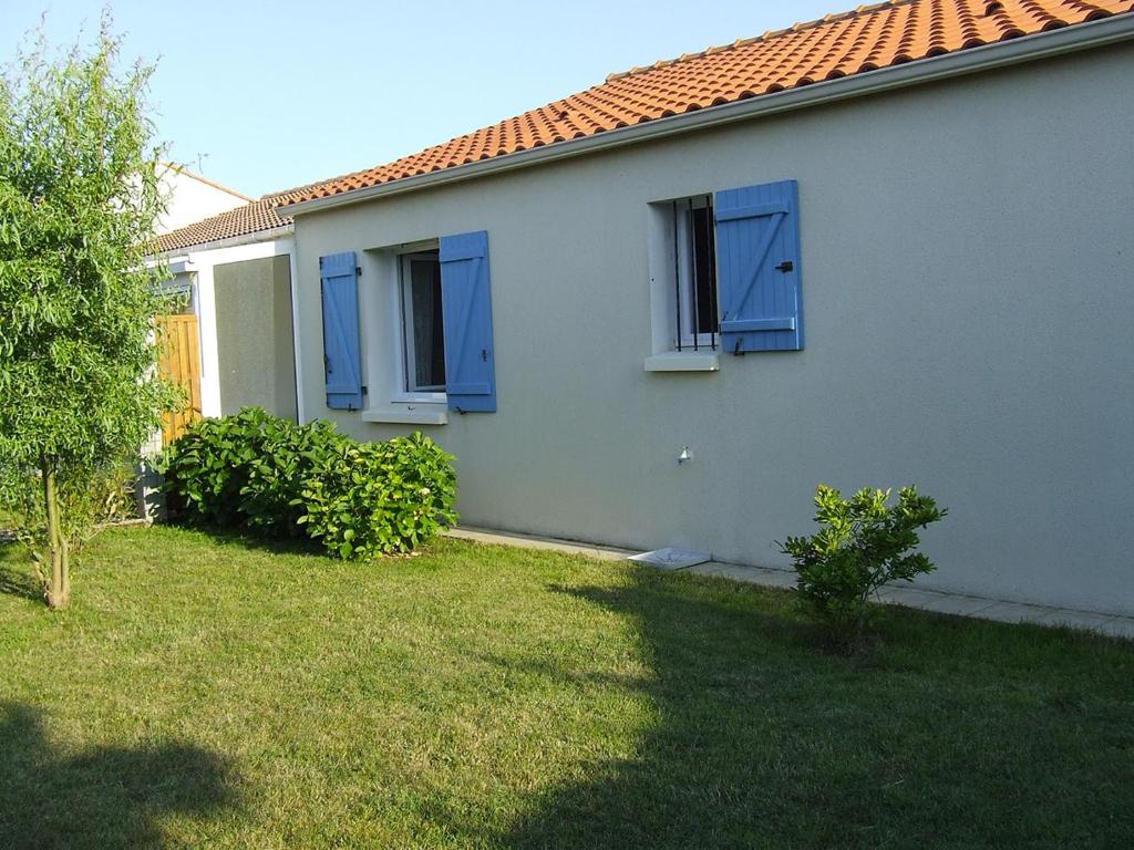 Une sympathique maison de vacances aux volets bleus photo 2