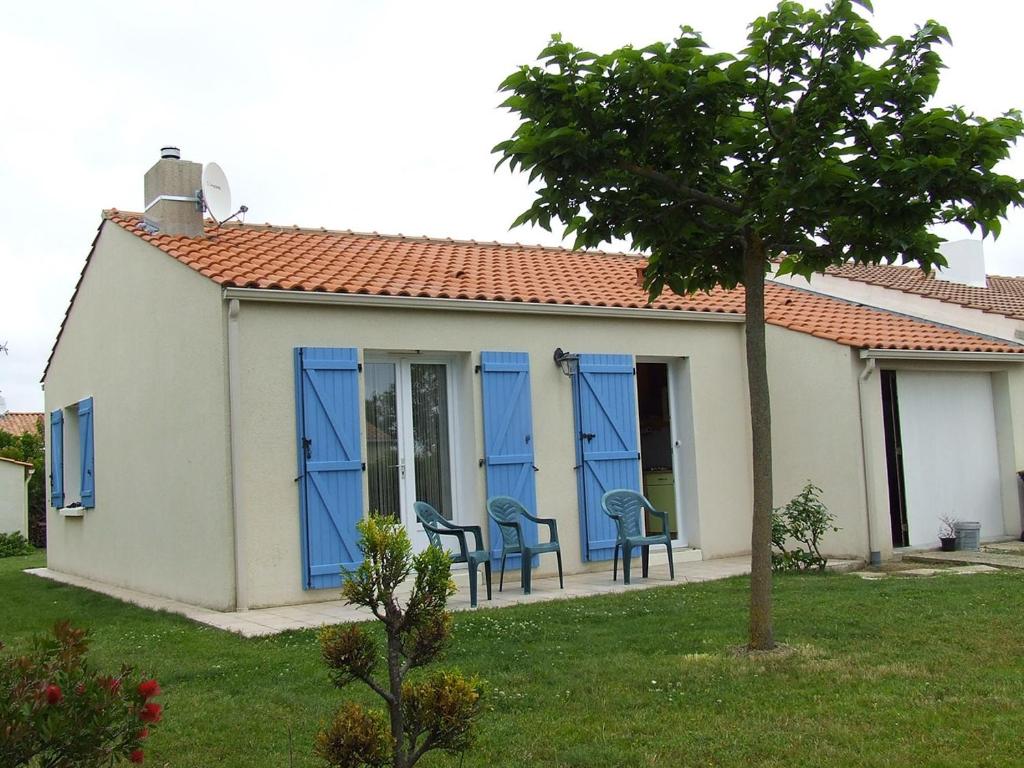 Une sympathique maison de vacances aux volets bleus photo 1