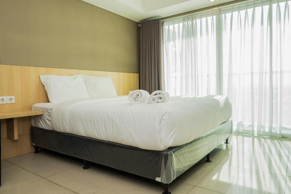 Strategic Studio Apartment at Tamansari La Grande near BIP By Travelio, Bandung