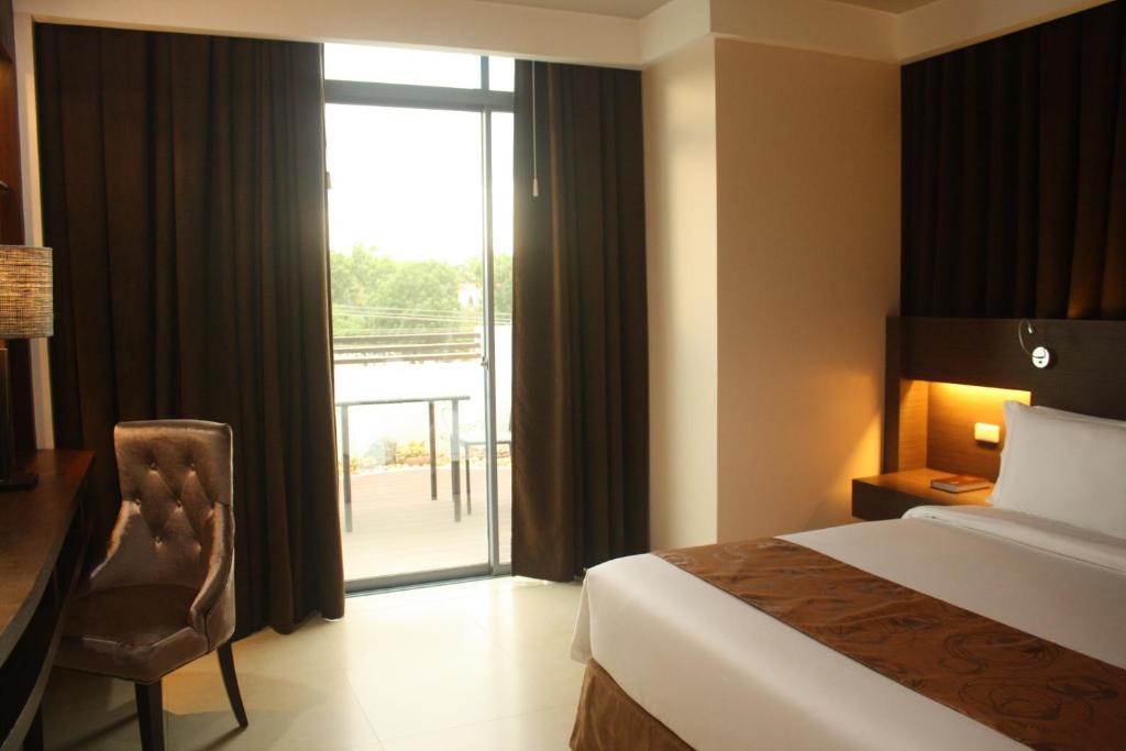 Двухместный (Двухместный номер Делюкс с 1 кроватью), Kew Hotel - Tagbilaran