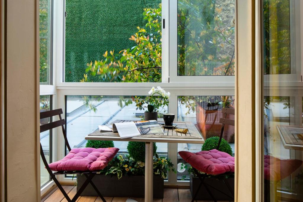 Двухместный (Улучшенный двухместный номер с 1 кроватью), Hôtel Tour Eiffel