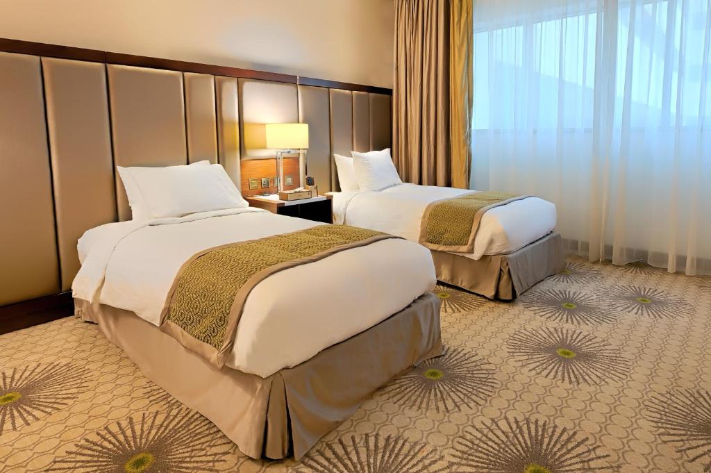 Holiday Suites Al Azizia - Tap to explore photos