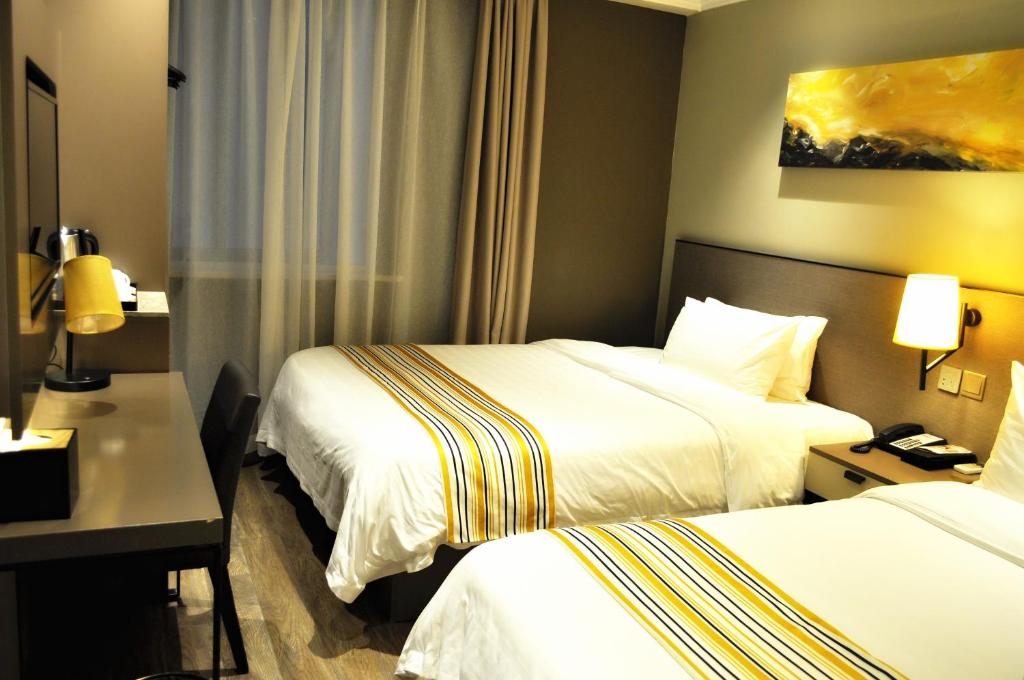 Двухместный (Двухместный номер Selected с 2 отдельными кроватями), Home Inn Plus Shanghai Huaihai Road Sinan Road
