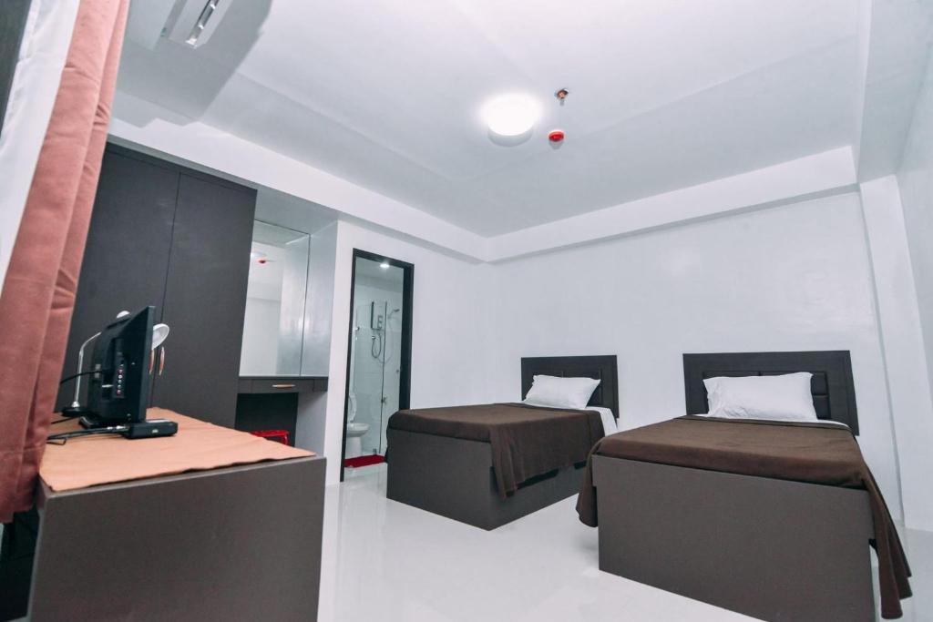 Студио (Двухместный номер-студио с 2 отдельными кроватями), The Strand Suites and Dormitel