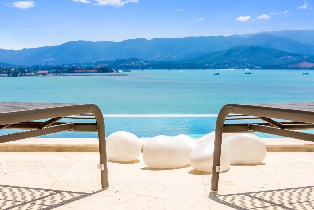 BEACHSIDE VILLA plus APARTMENT - AVA - at SUNSET COVE LUXURY VILLAS, 5 BED 5 BATH, Amazing SEA and MOUNTAIN VIEWS, only 100m walk to Swimming Beach photo 1