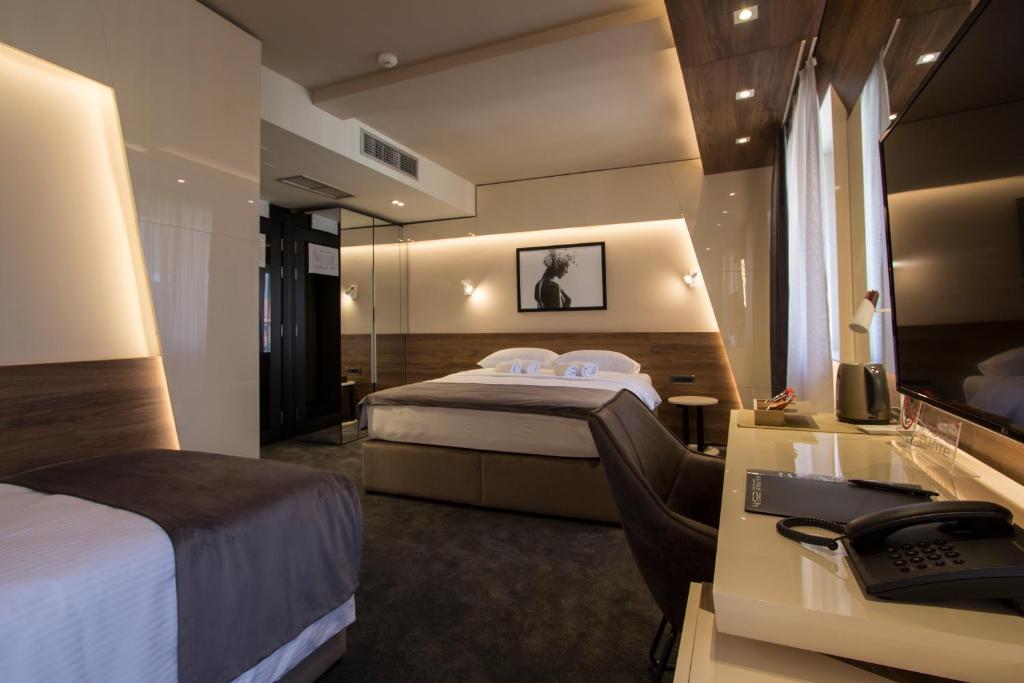 Garni Hotel Boutique 25h - Tap to explore photos