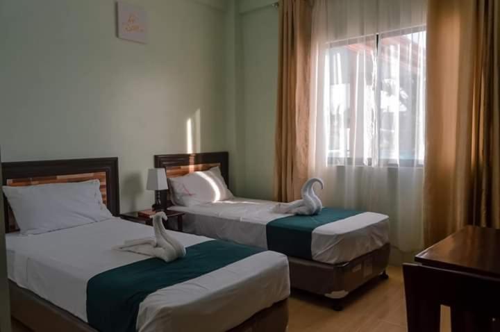 Двухместный (Двухместный номер Делюкс с 2 отдельными кроватями), Adams View hotel