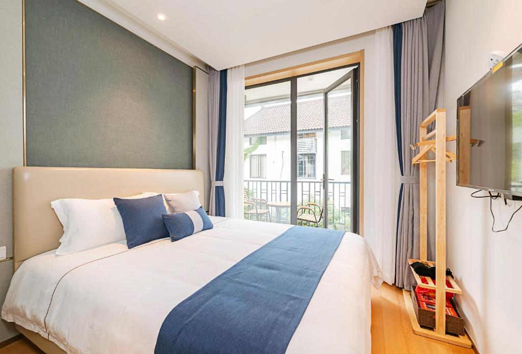 Двухместный (Двухместный номер с 1 кроватью и балконом), Hangzhou Ziwei Boutique Homestay