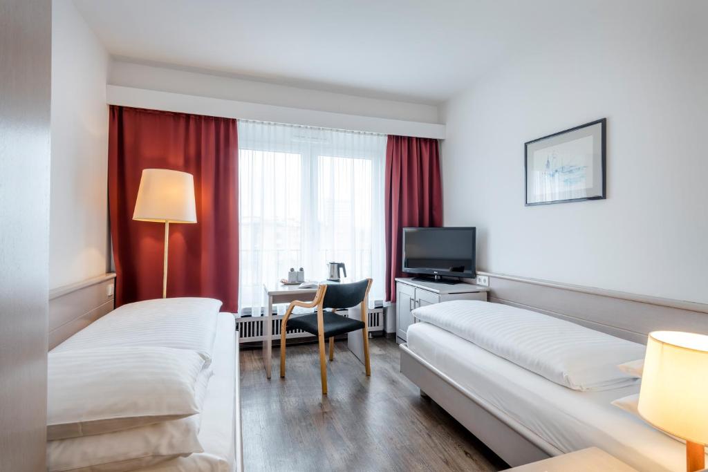 Двухместный (Небольшой двухместный номер с 2 отдельными кроватями), Hotel Imlauer & Bräu