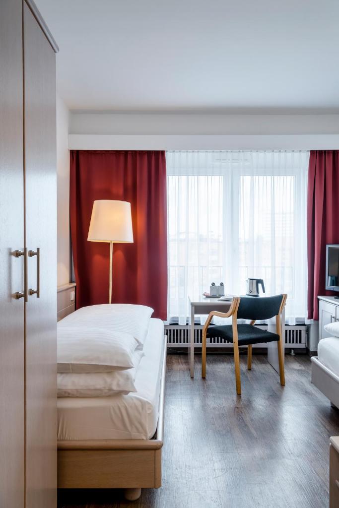 Двухместный (Небольшой двухместный номер с 2 отдельными кроватями), Hotel Imlauer & Bräu