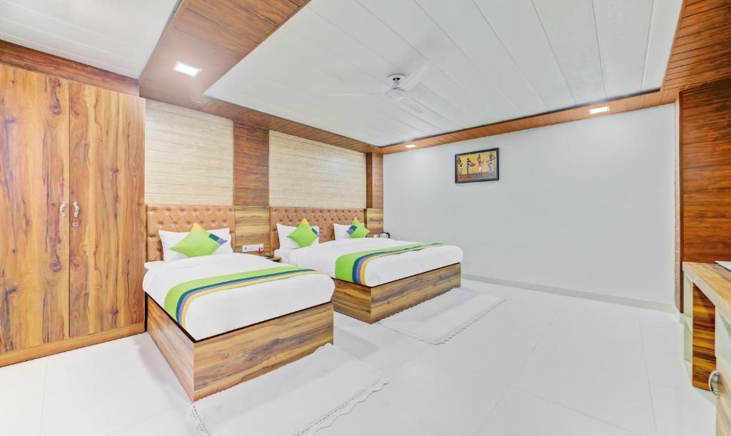 Двухместный (Двухместный номер Делюкс с 1 кроватью), Treebo Trend Nysha Palace